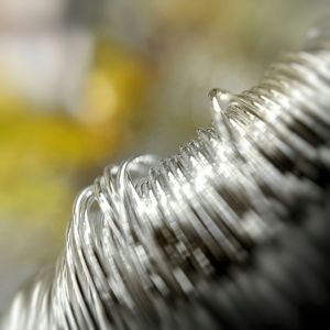 Close-up of rolled up cables at industry