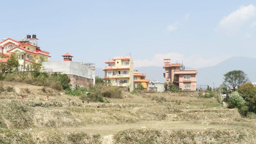 Buildings against sky