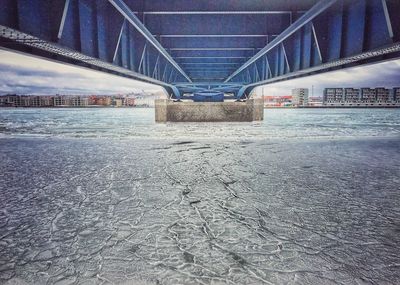 Full frame shot of bridge in city against sky