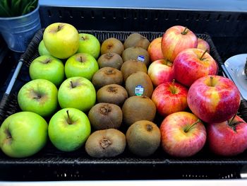 Close-up of apples and kiwis