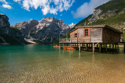 Scenic view of sea and buildings against sky