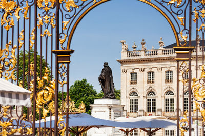 Statue of historic building against clear sky