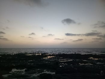 Scenic view of sea against sky during sunset