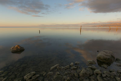 Scenic view of sea against sky during sunset