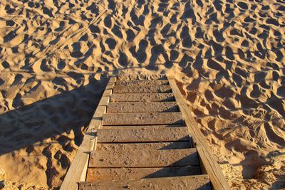 High angle view of wooden ladder at beach