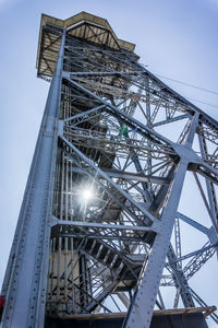 Low angle view of metal structure against sky