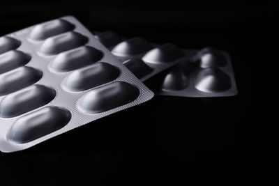 High angle view of keyboard against black background