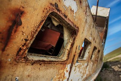 Old rusty window of abandoned building