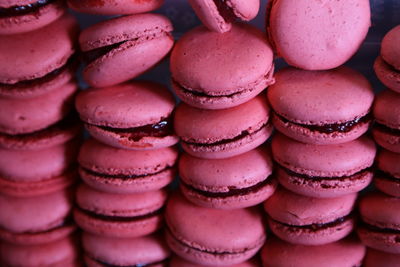 Close-up of stacked pink macaroons