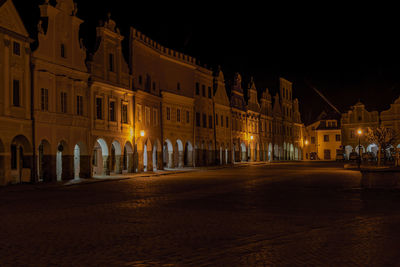 Illuminated buildings in city at night