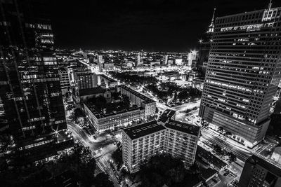 High angle view of illuminated city at night
