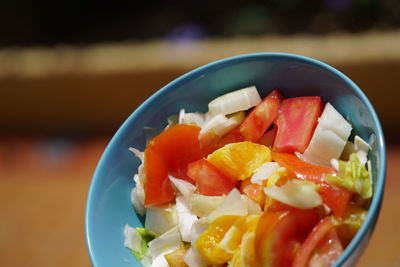 Close-up of chopped fruits in bowl