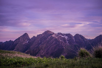 Scenic view of mountains against sky during sunset