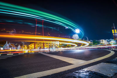 Light trails on city street at night