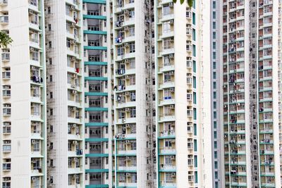 Full frame of residential buildings in city 
