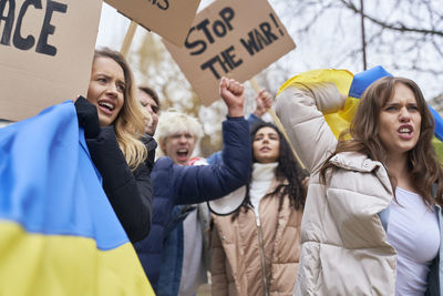 Female protesters protesting on street