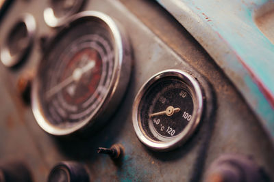 Old tractor dashboard. temperature scale closeup.
