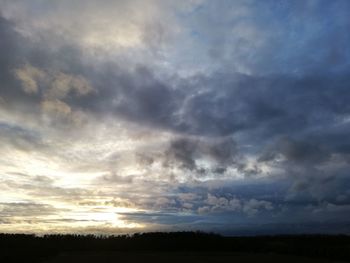 Scenic view of silhouette landscape against sky during sunset