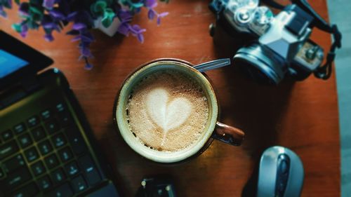 High angle view of coffee cup on table