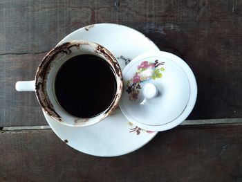 High angle view of coffee cup on table