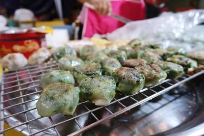 Close-up of meat on barbecue grill