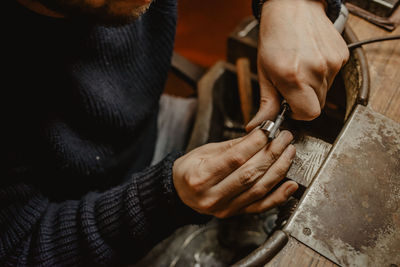 Midsection of man working