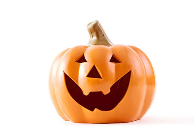 Close-up of jack o lantern against white background