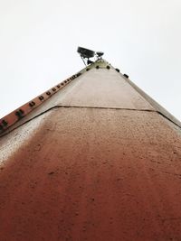 Low angle view of windmill against clear sky