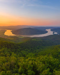 Scenic view of landscape against sky during sunset