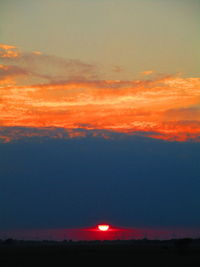 Scenic view of dramatic sky during sunset