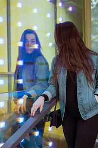 Young woman standing in city