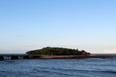 Scenic view of sea against clear sky