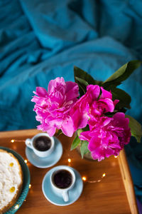 Close-up of pink flowers on table