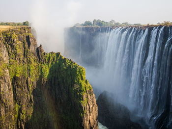 Scenic view of victoria falls waterfall at border between zambia and zimbabwe