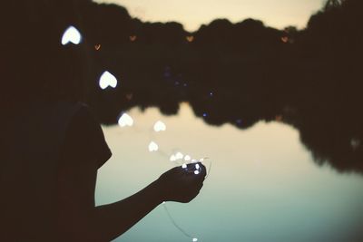 Close up of hand holding white background