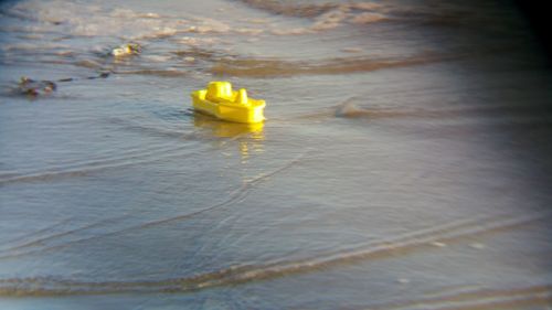 Yellow floating on water