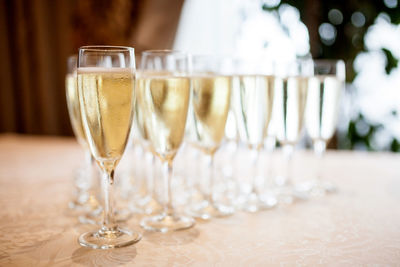 Glasses with cold champagne on the table