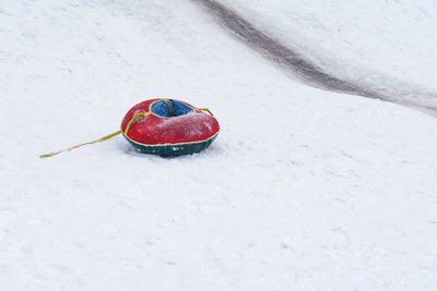 Snow tube on field during winter