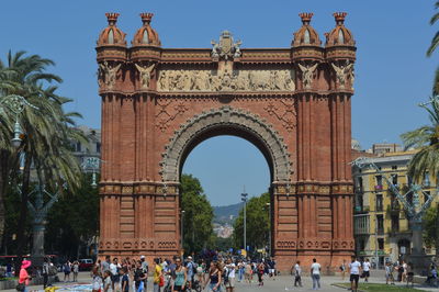 Group of people in front of historical building