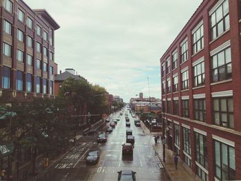 Road in city against sky