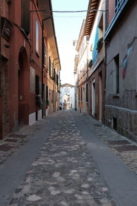 Narrow street between buildings