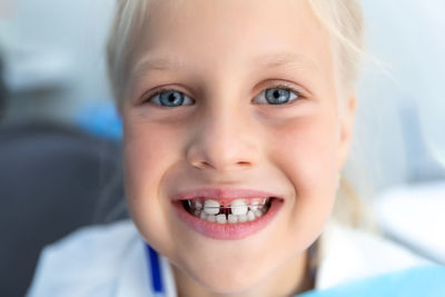 Close-up portrait of smiling boy