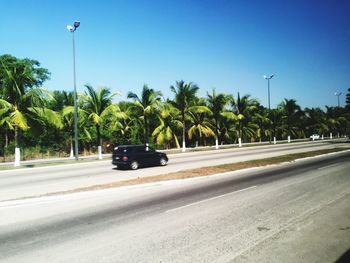 Car on road against clear sky