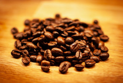 Close-up of coffee beans on table