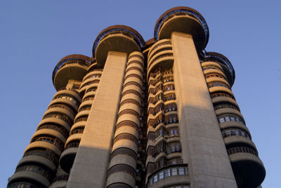 Low angle view of building against blue sky