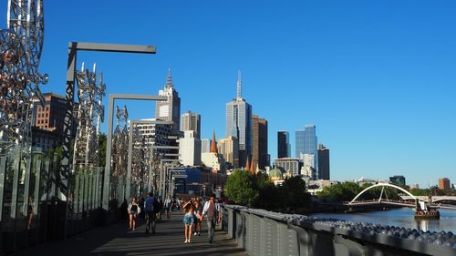 View of skyscrapers against blue sky