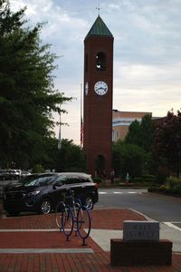 Bicycle parked in front of building