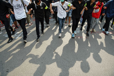 People walking on street in city