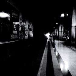 Empty walkway at night