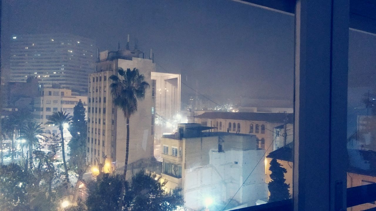VIEW OF CITY AT NIGHT
